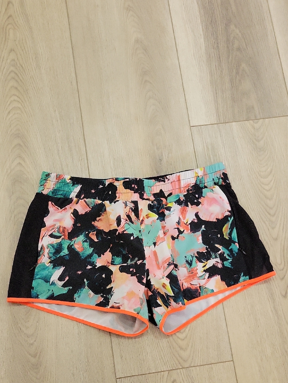 Fabletics Floral Splash Athletic Shorts in Black, Teal, Pink & Coral